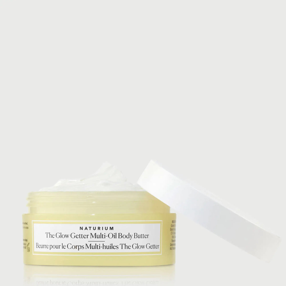 the-glow-getter-multi-oil-body-butter-travel-size-d0 NATR-40115_Glow-Getter-Body-Butter-Mini_front_capoff_bonebkgd.webp