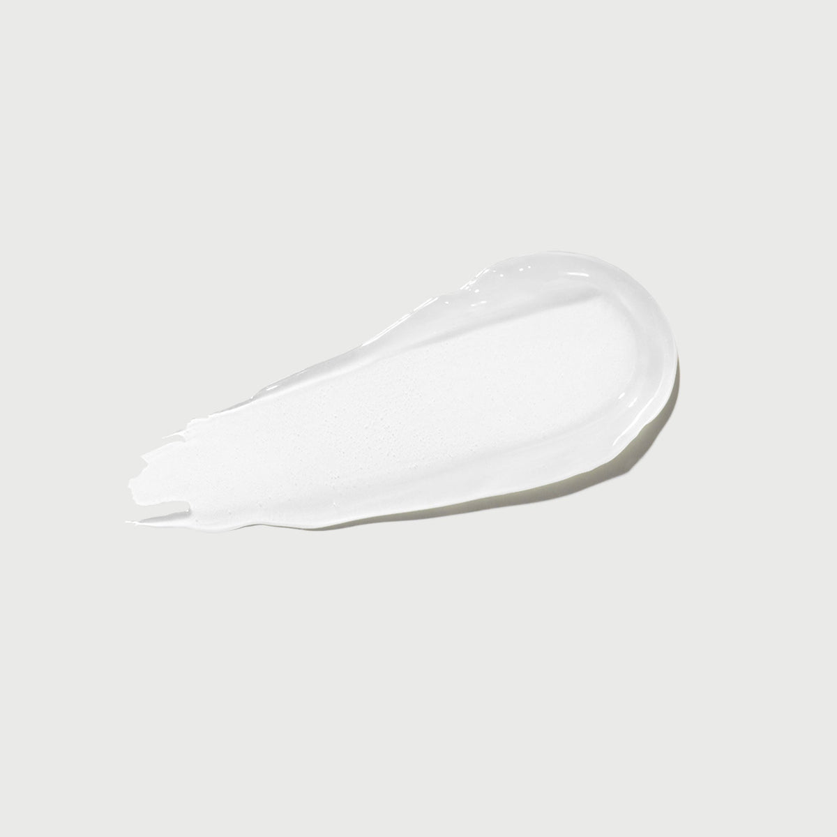 phyto-glow-lip-balm-clear-v9 NATR-60066-Swatch-Phyto-Glow-Clear-bonebkgd.jpg