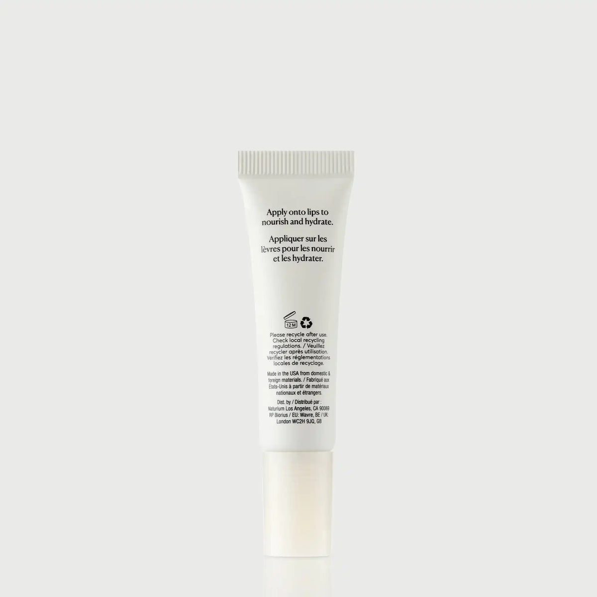 phyto-glow-lip-balm-clear-v9 NATR-60066_PhytoGlow_Clear_primary_capon_back-bonebkgd.webp