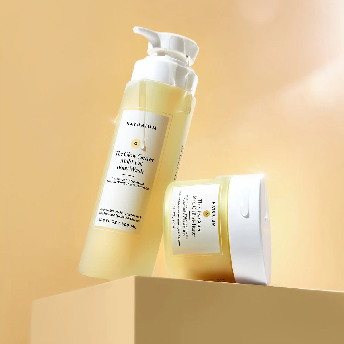 the-glow-all-out-body-bundle-t2 gg-bodybutter_1464-crop_revcolor_FL.webp